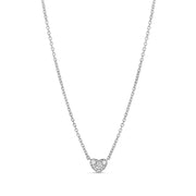 18-karat white gold heart diamond necklace with a pave-set pendant. 